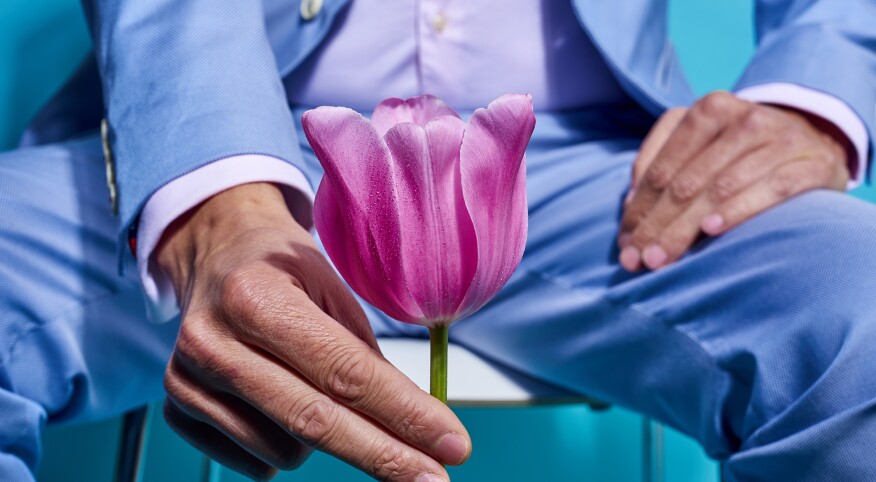 Man holding Tulip flower