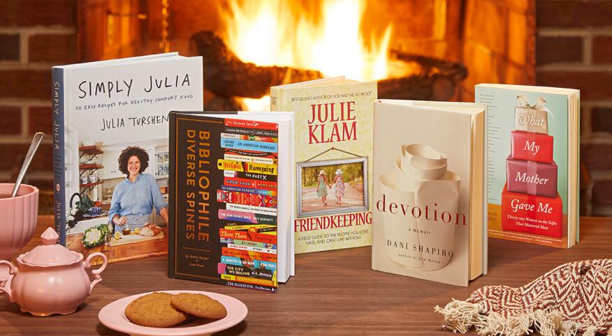 Books in front of a warm fire