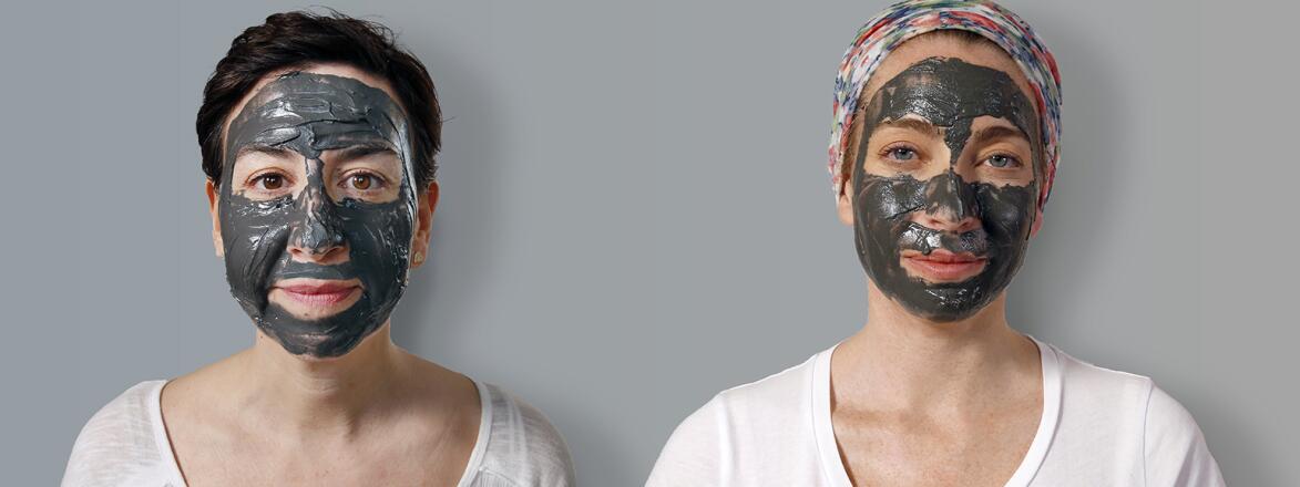 two women with magnetic face masks on