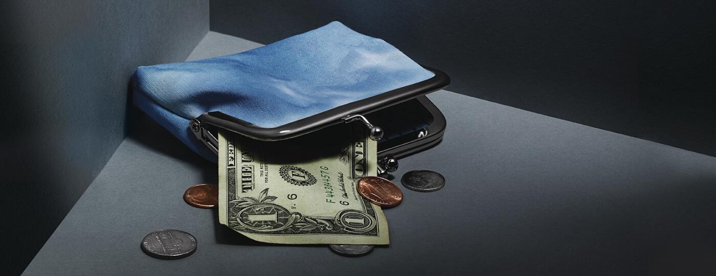 coin purse with money coming out