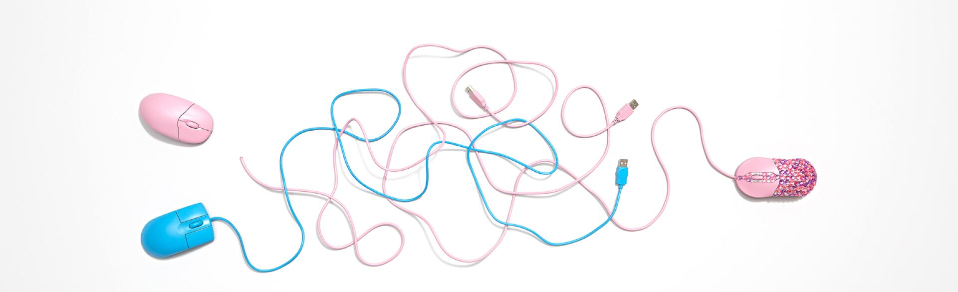 three computer mouse, two are pink one is blue showing why married men flirt online