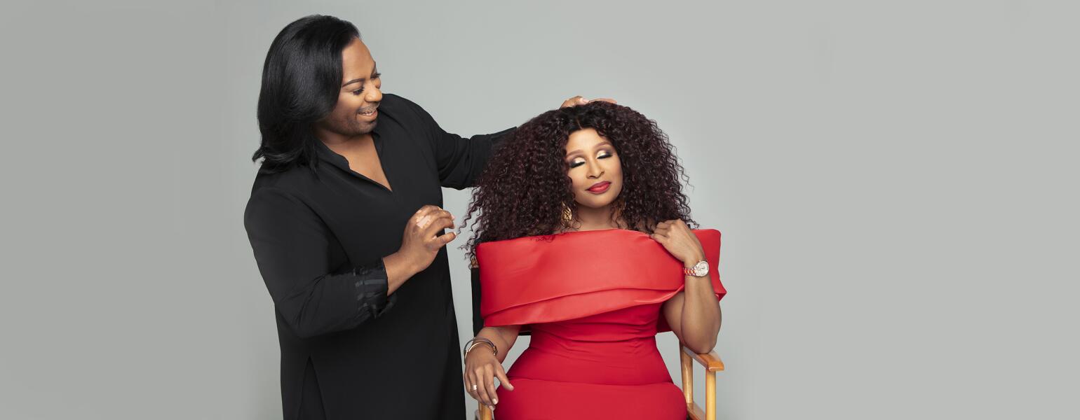 Woman getting fitted for wig by stylist