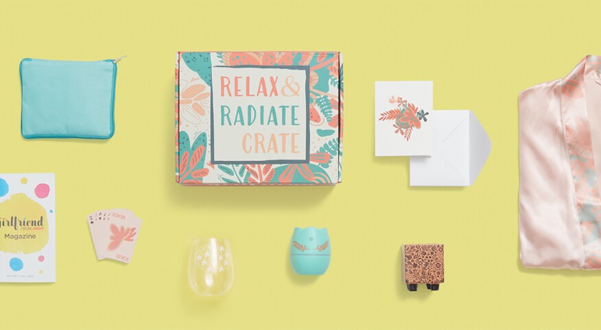 Fall 2020 Relax and Radiate crate contents photographed from above on a yellow background