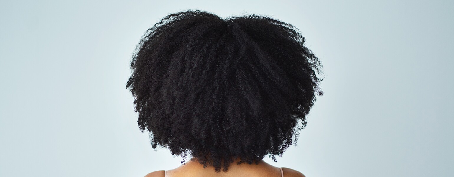 image_of_thick_curly_hair_on_black_woman_GettyImages-1059157466_1540.jpg