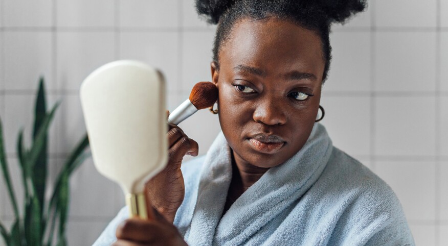 image_of_woman_applying_makeup_brush_Stocksy_txpf406b5ed7WS300_Large_3704728_1800