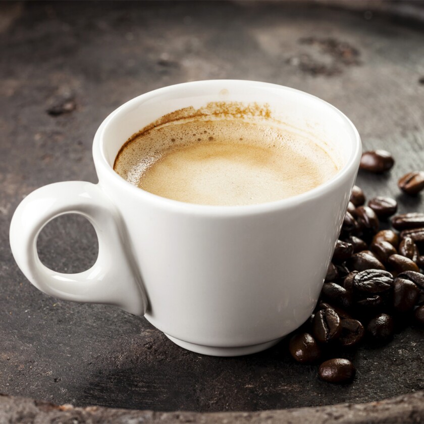 coffee mug with coffee beans