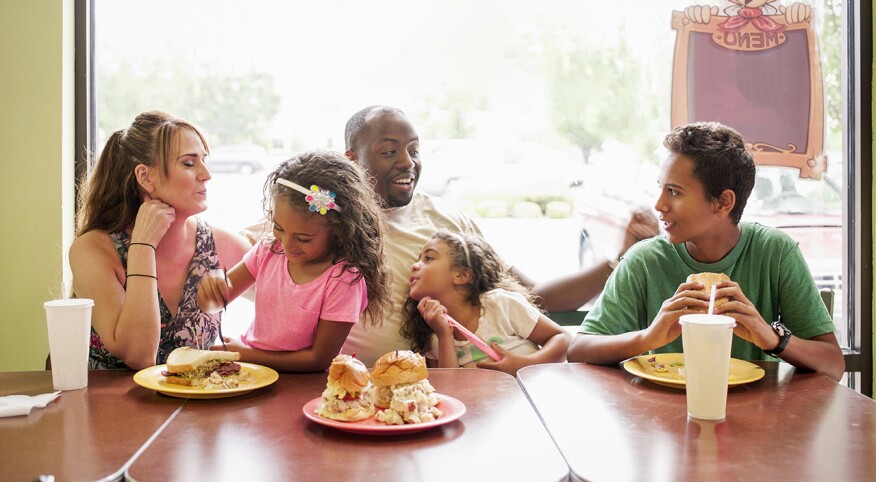 Family eating at a fast food restaurant