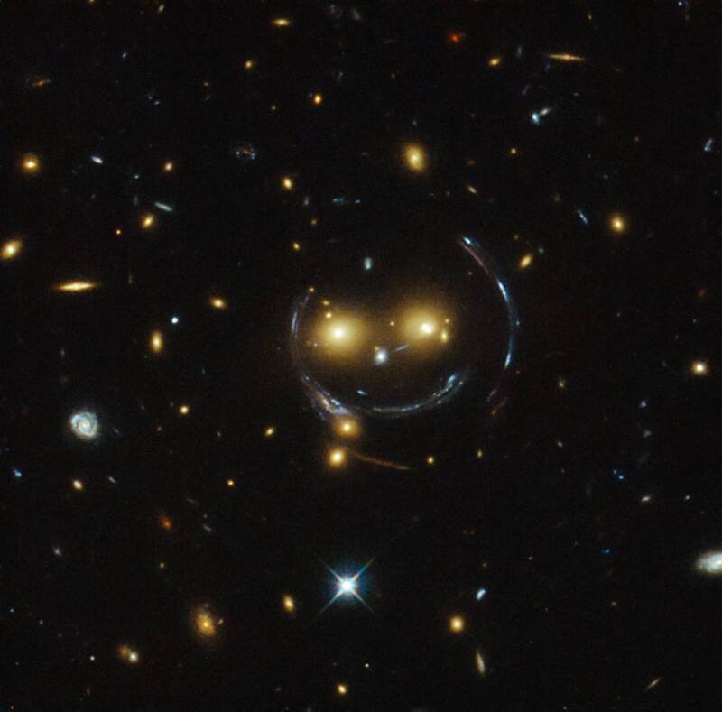 A smiling lens - NASA space image from Hubble Telescope