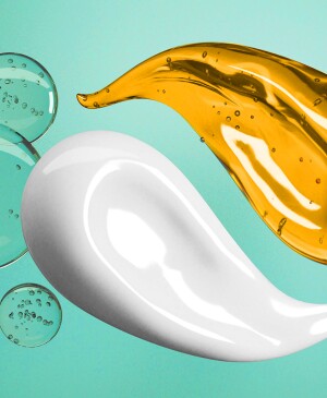 Cream and Essence oil mixed surrounded by warter bubbles on a white background.-3d rendering.