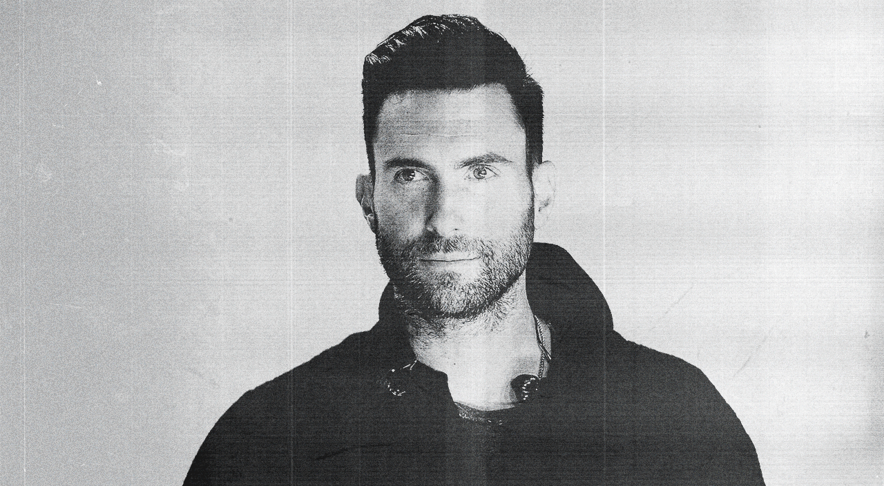 Adam Levine photo with animated icons of hearts and fire over the photo