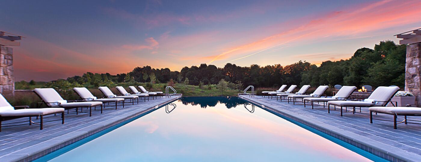 A photo of an in-ground pool at a luxury spa.