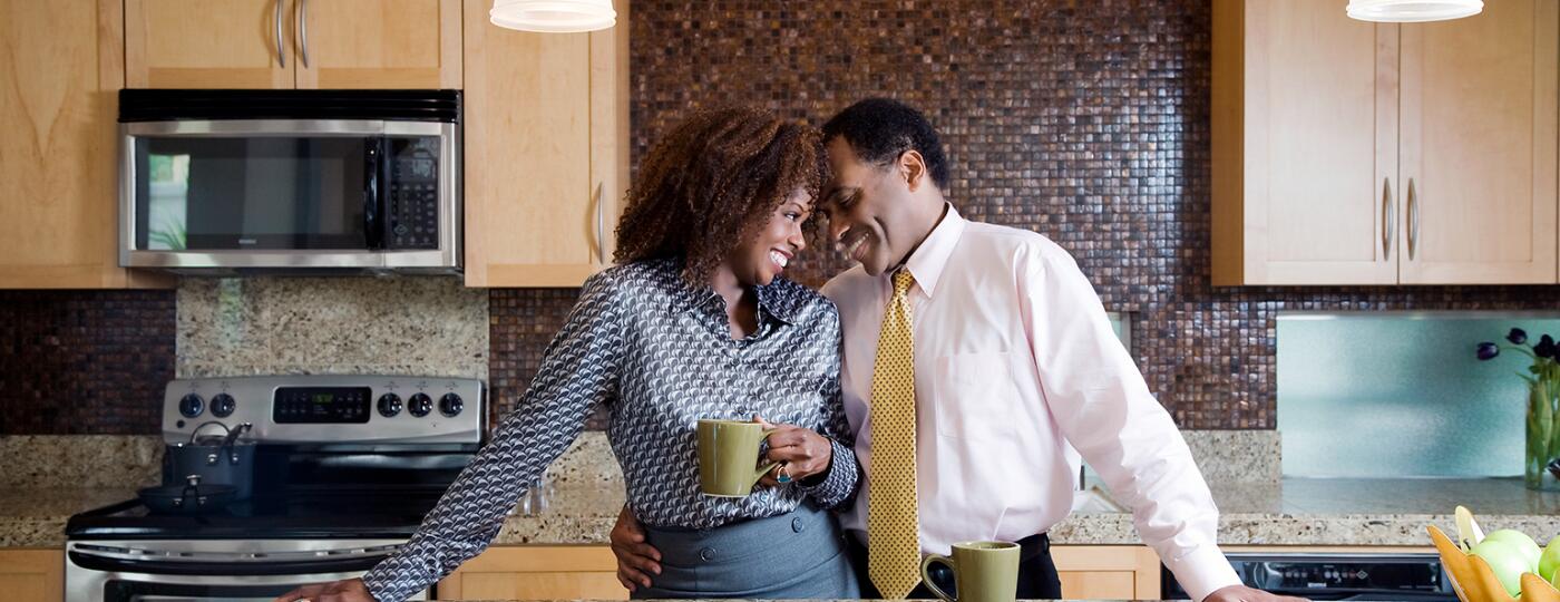 image_of_black_couple_touching_foreheads_in_kitchen_GettyImages-91497683_1540.jpg