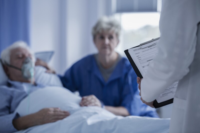 older-patient-with-wife-and-doctor.jpg