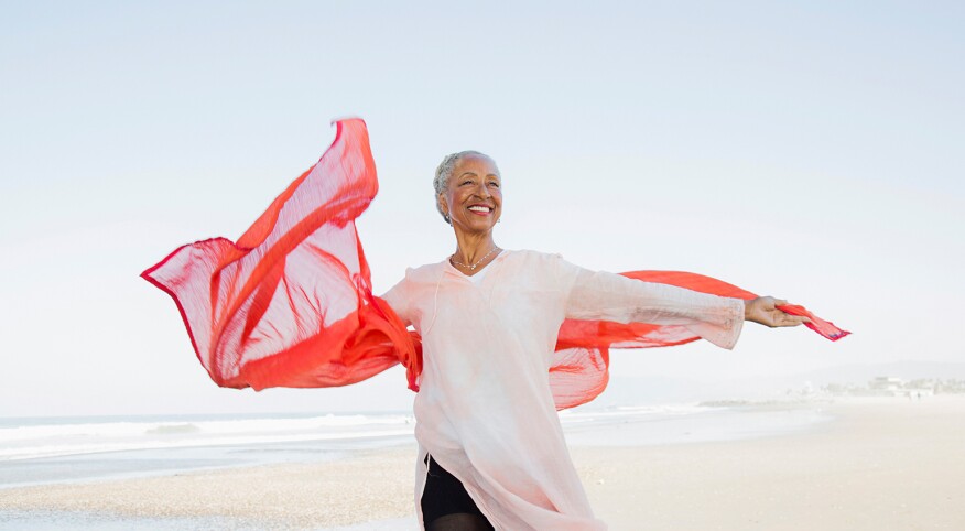 image_of_mature_black_woman_on_beach_GettyImages-905548586_1540.jpg