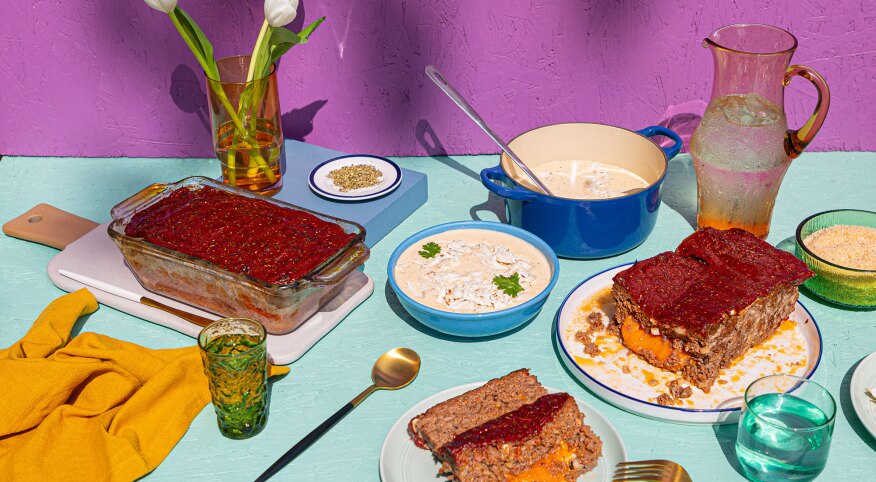 Meatloaf and crap recipe styled on colorful surface