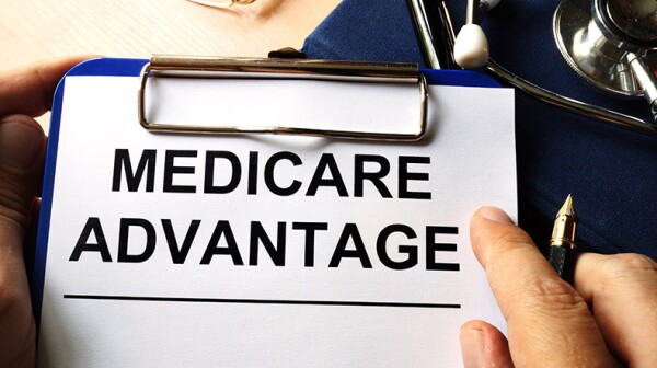 Medicare advantage written on a clipboard