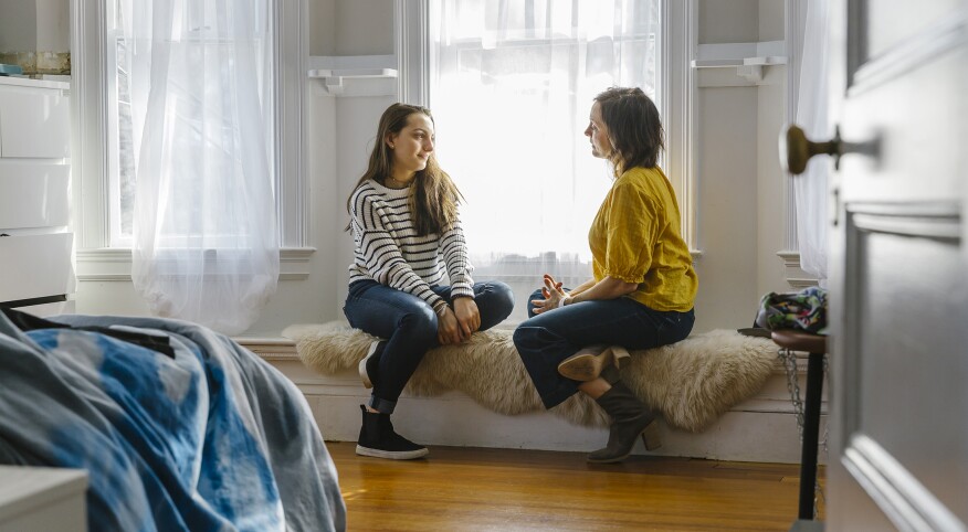 Mother And Daughter Having Private Chat At Home