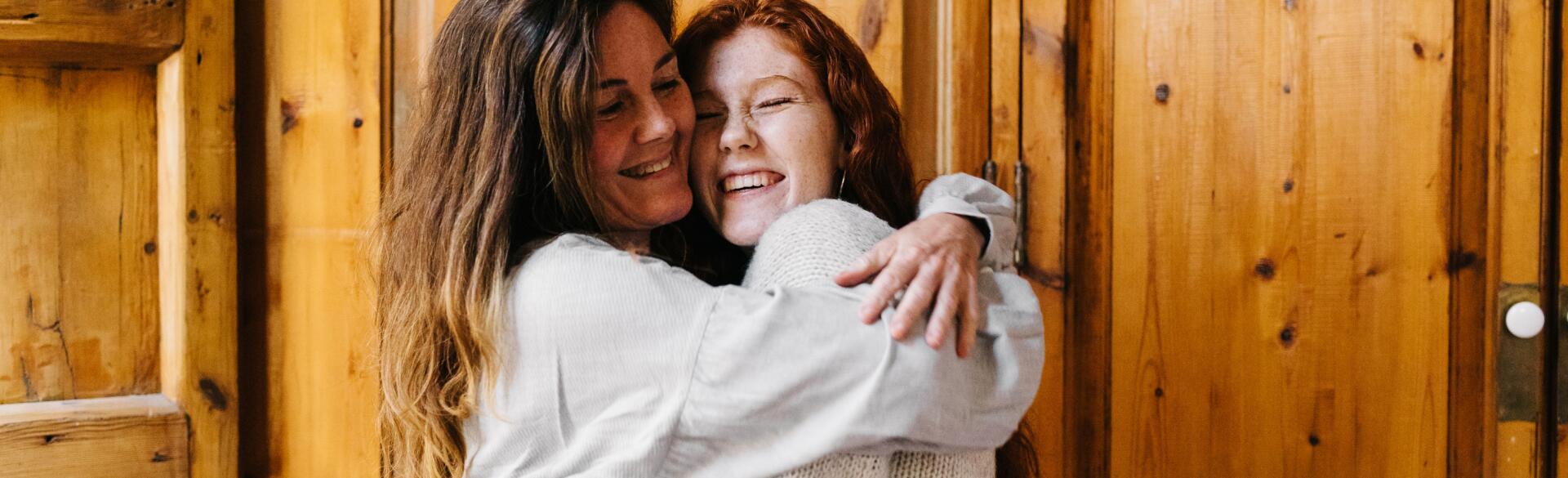 Mother and Daughter embracing