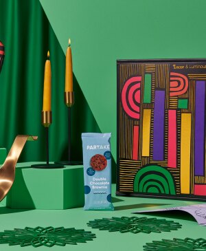 Products styled on green background
