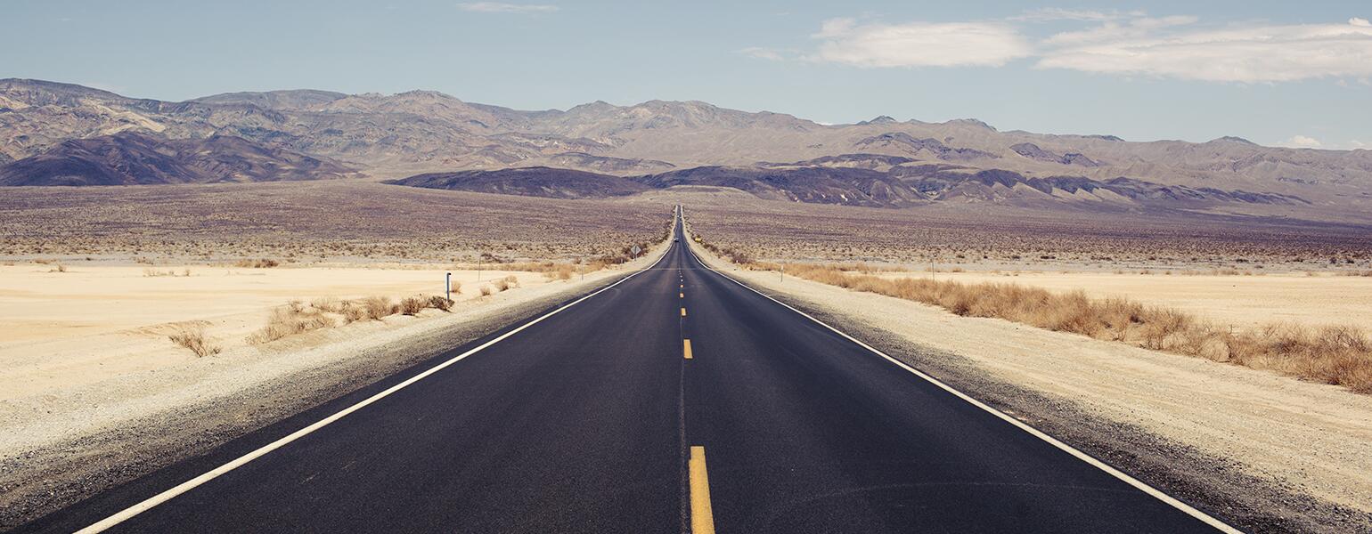 Empty road in the desert representing loneliness.