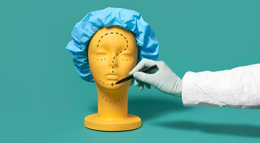 mannequin head with surgery question marks