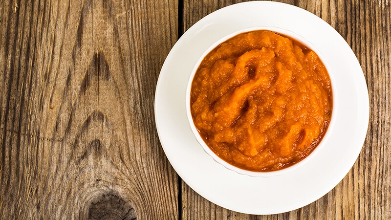 A close-up view of pumpkin puree in a bowl