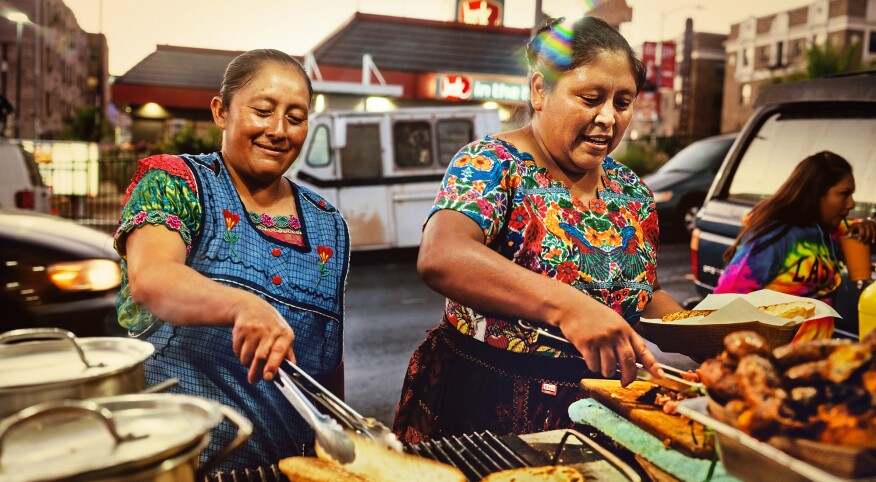 Vendors serve Guatemalan food in the Westlake neighborhood in Los Angeles, Oct. 20, 2019. (Rozette Rago/The New York Times)