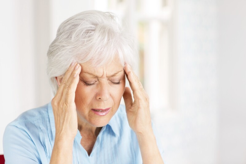 Senior Woman With Headache.