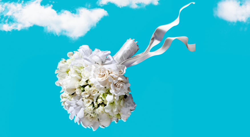 Bouquet of wedding flowers flying in the air