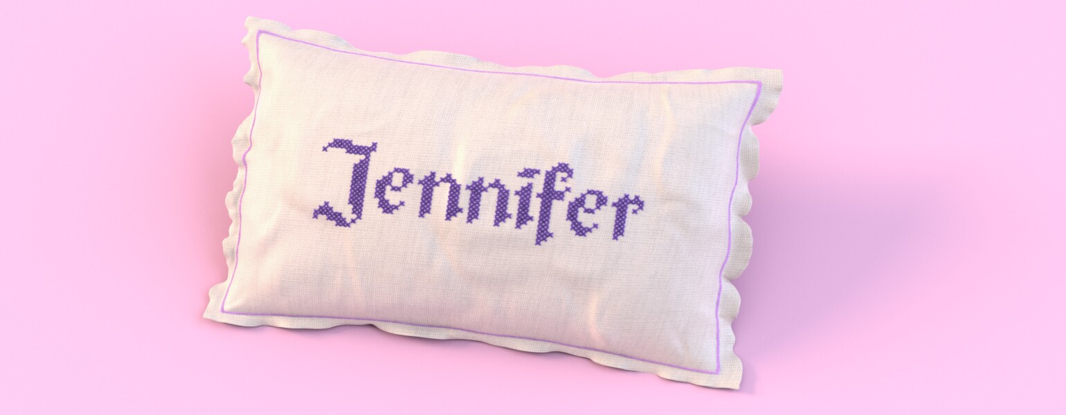 image of the name jennifer stitched on a pillow by the girlfriend staff