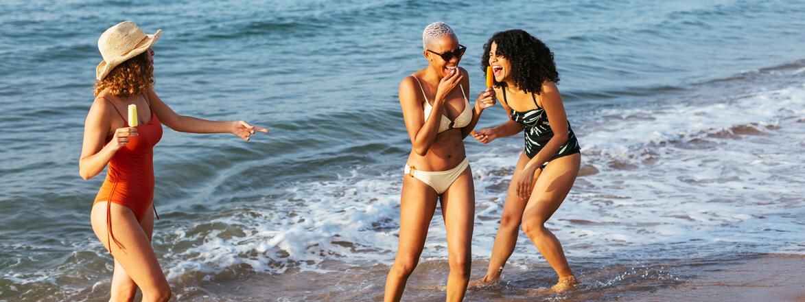 women on a girls trip on the beach