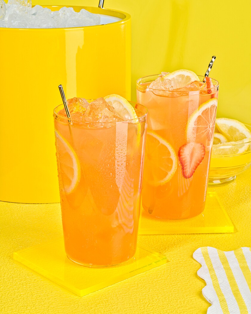Lemonade cocktails on bright yellow background