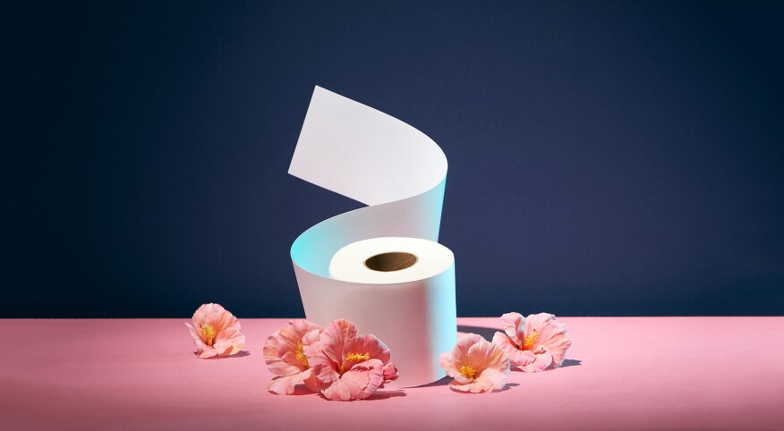 Roll Of Toilet Paper On Color Background