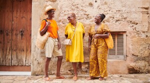 Three women sightseeing on vacation in Pollensa, Majorca, Spain