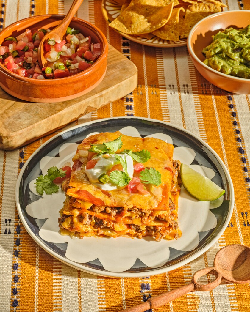 Overhead plate of enchilada casserole with pico de gallo