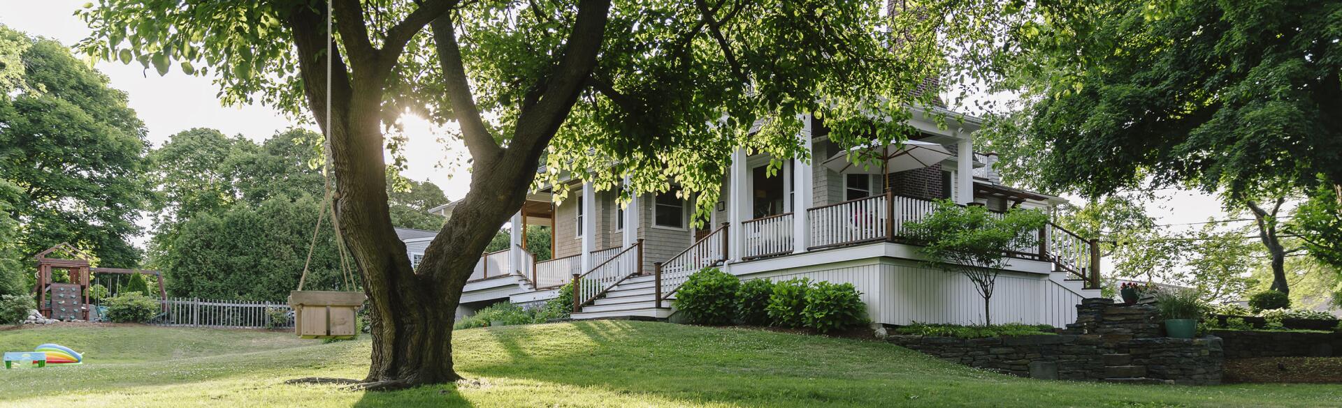 photo of house with large front yard