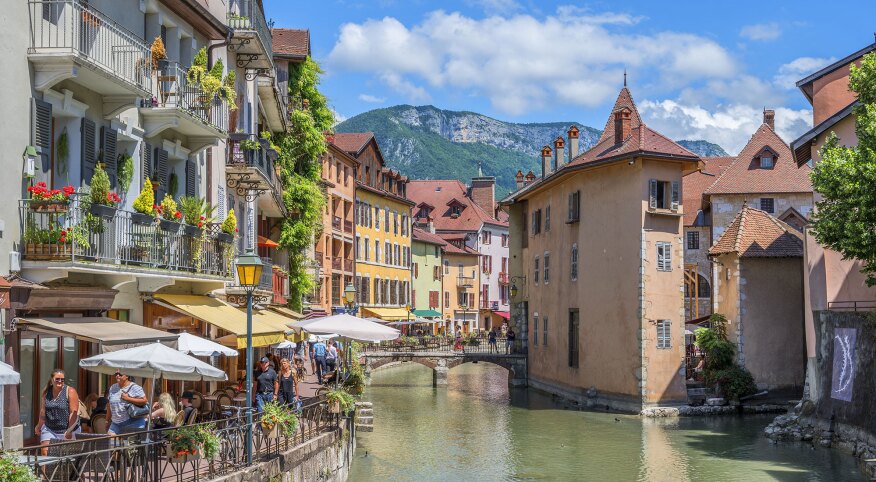 Landscape of Promenade on the Canal de Thiou with the Palais de l'Isle in Annecy, France