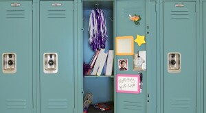 An image of an open high school locker.