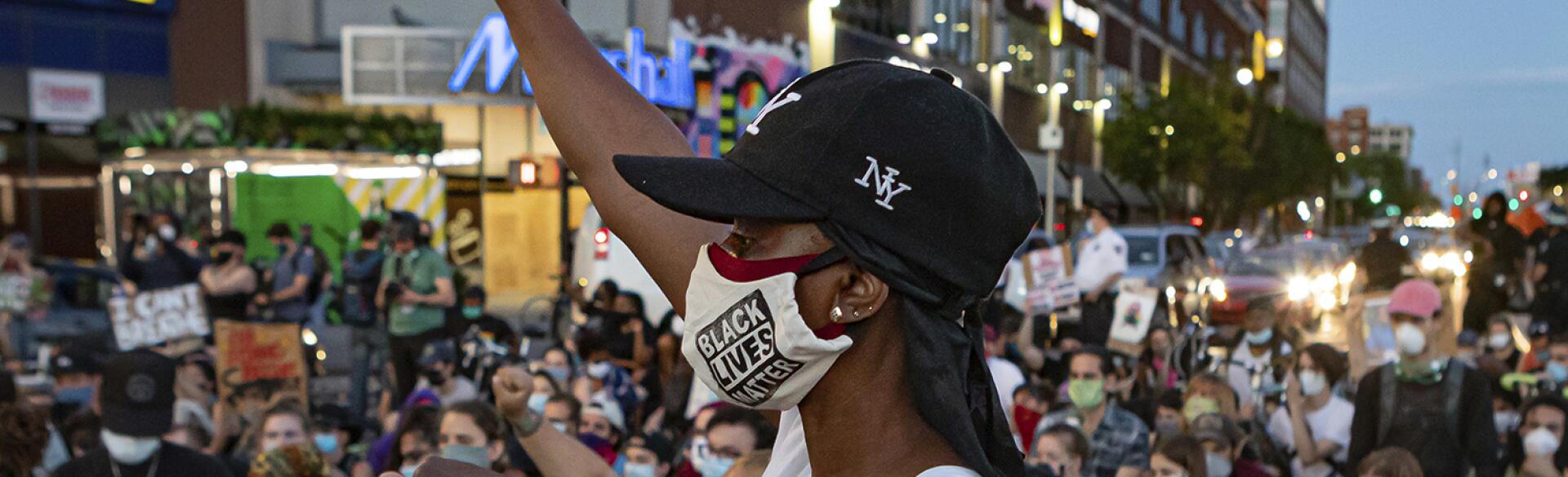 Black_woman_center_BLM_protest_1500_AP_20159530987740.jpg
