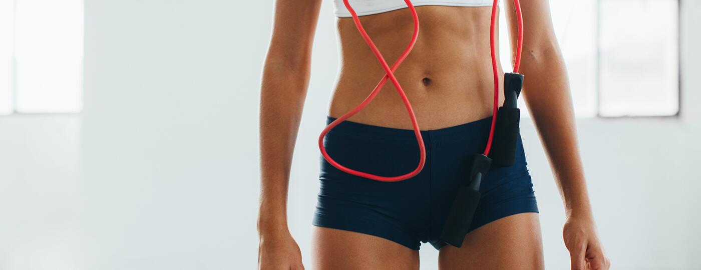 image_of_womans_flat_stomach_with_jumprope_hanging_from_neck_Stocksy_txpa33217d90LZ200_OriginalDelivery_1183186_1540.jpg