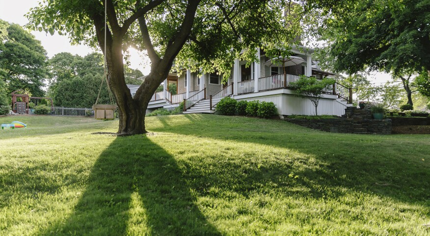 photo of house with large front yard