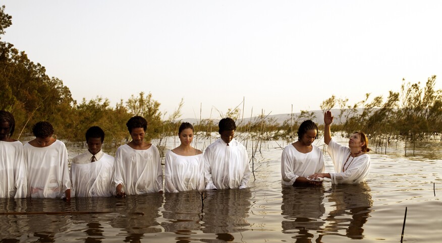 image_of_baptism_in_body_of_water_GettyImages-200240947-002_1540.jpg