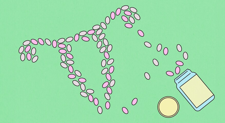 illustration of probiotic pills forming shape of uterus