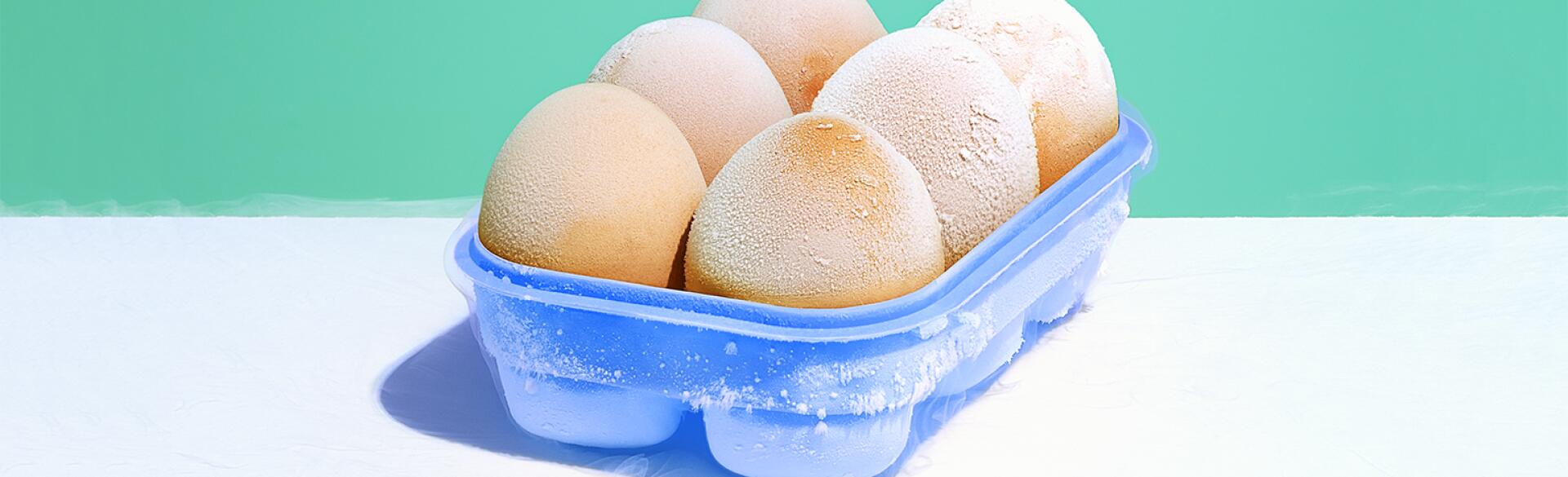 An image of six eggs in a carton.