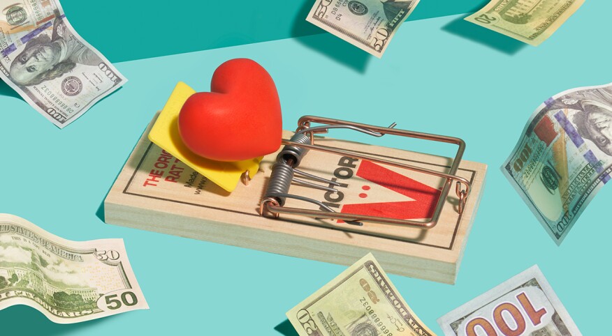Image of a mouse set mouse trap with a heart in the center and dollar bills surrounding it