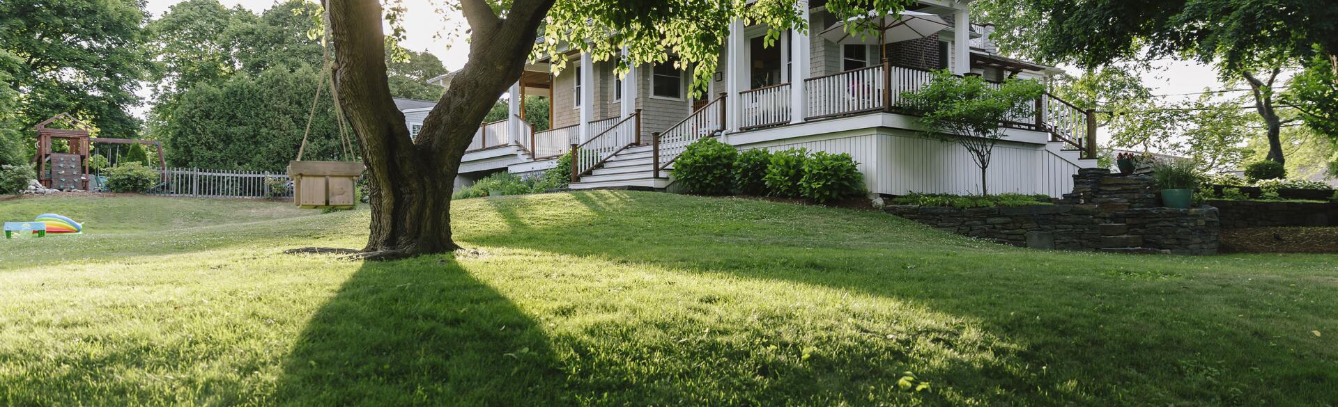 photo of house with large front yard