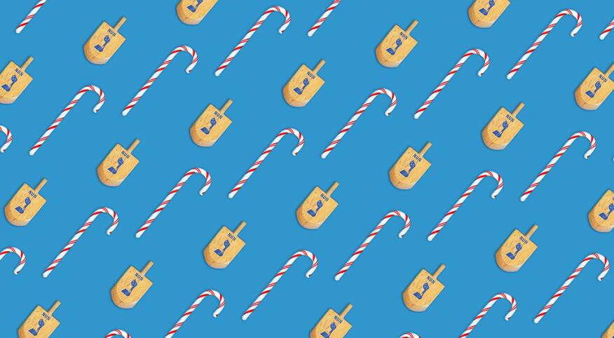 pattern_of_christmas_candy_canes_and_jewish_dreidels_by_chris_oriley_1440x560