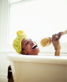 image_of_black_woman_in_bathub_with_shower_cap_GettyImages-639546321_1540.jpg