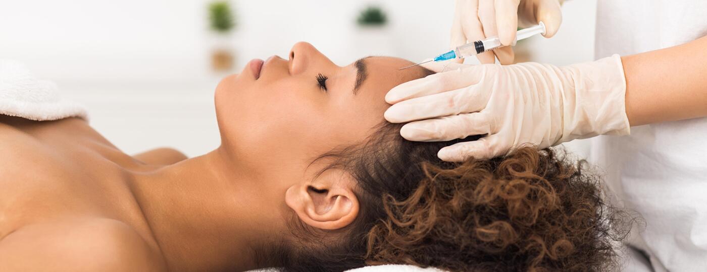 image_of_black_woman_getting_medi_spa_treatment_RRXEAW_1540.jpg