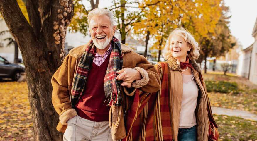 man and woman in a fall scene